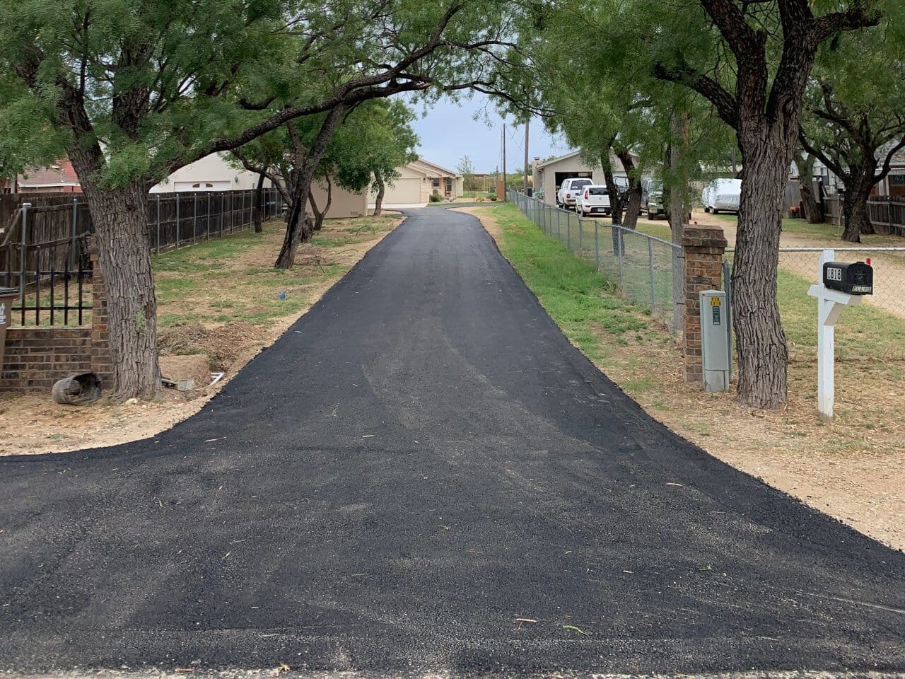 Completed residential asphalt driveway