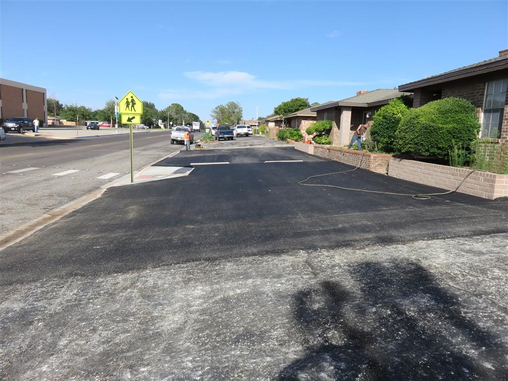 Sealcoated driveway protected from the West Texas sun