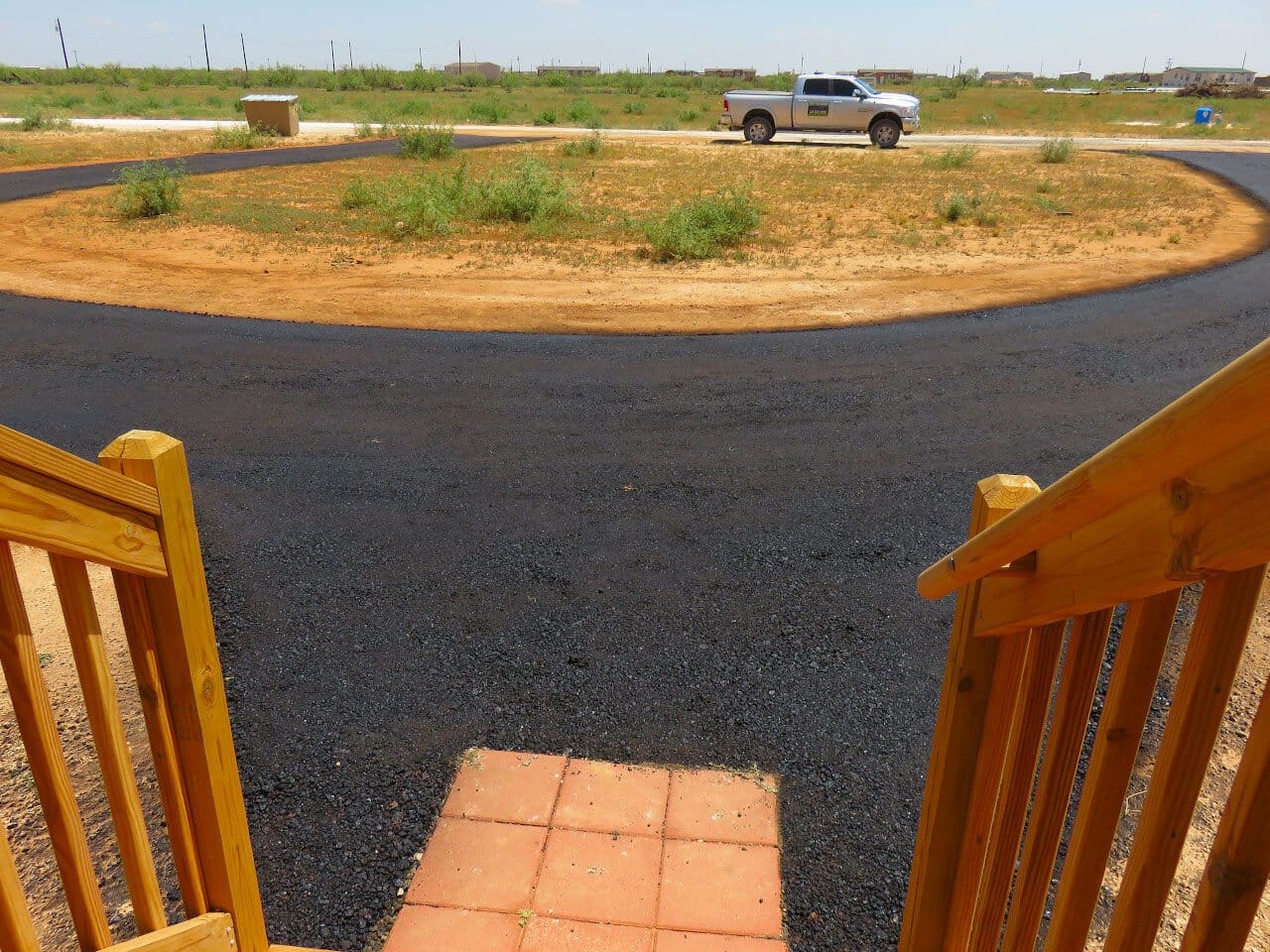 New asphalt driveway under construction