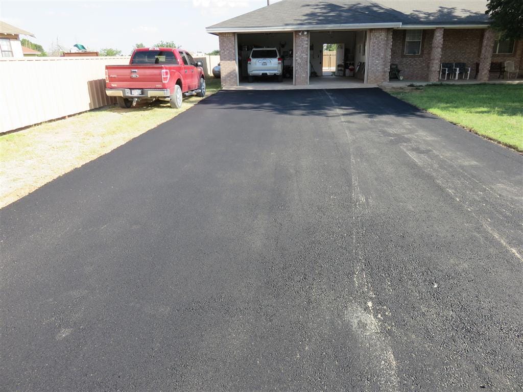 New residential asphalt driveway